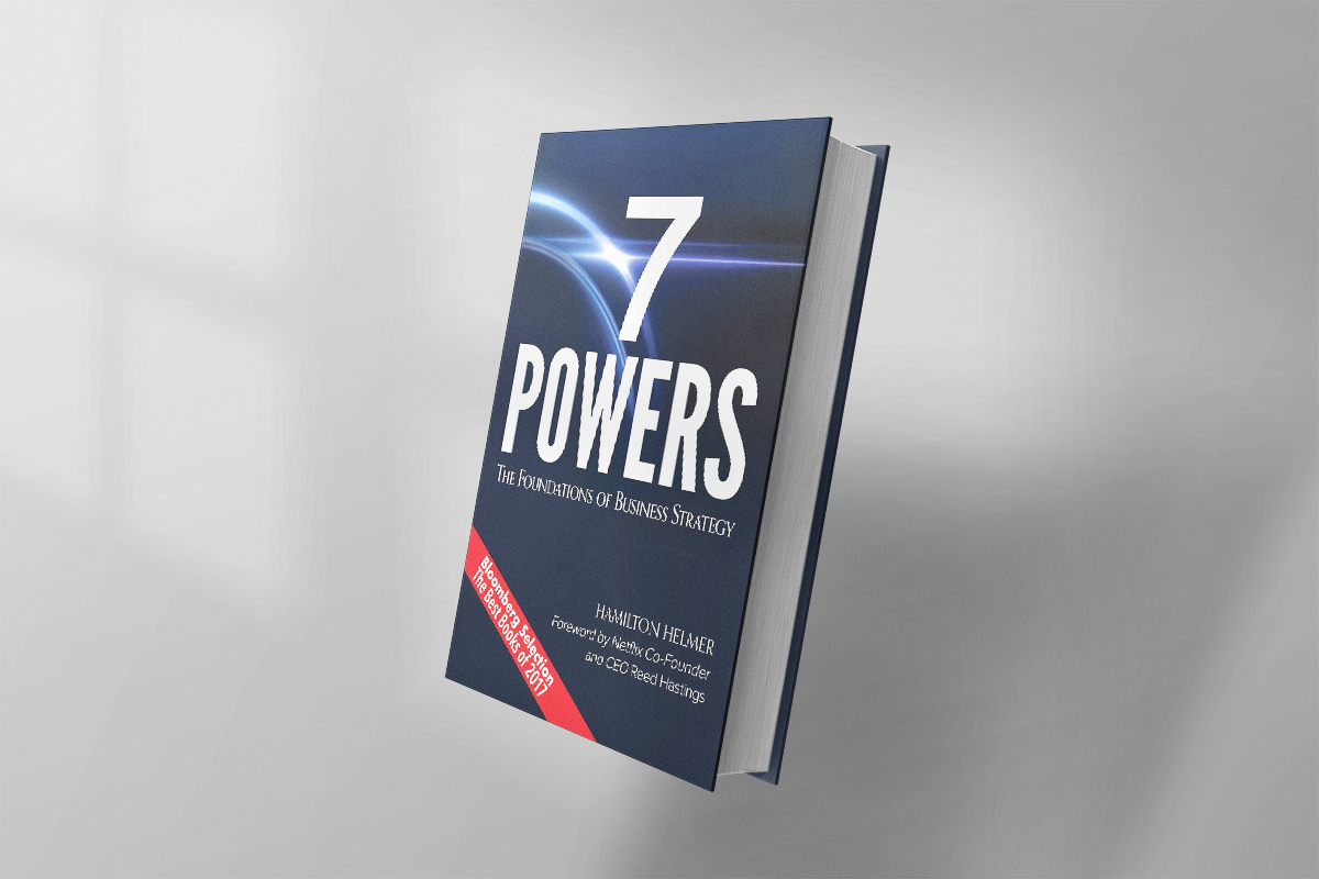 The book 7 Powers: The Foundations of Business Strategy by Hamilton Helmer features a sleek dark blue cover with dynamic light streaks, presenting a strategic framework that outlines seven sources of enduring business advantage.