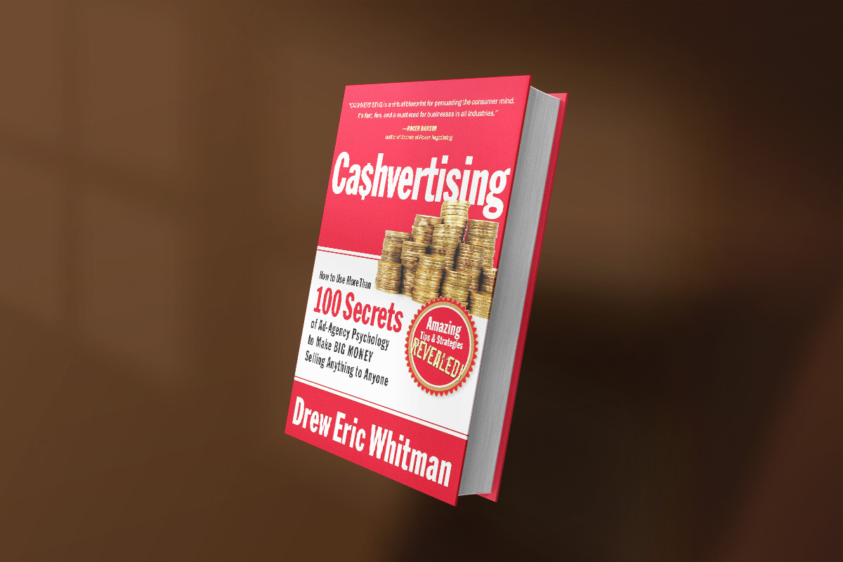 Cover of "Ca$hvertising" by Drew Eric Whitman, showcasing stacks of gold coins and bold red and white text about using ad-agency psychology to boost sales.