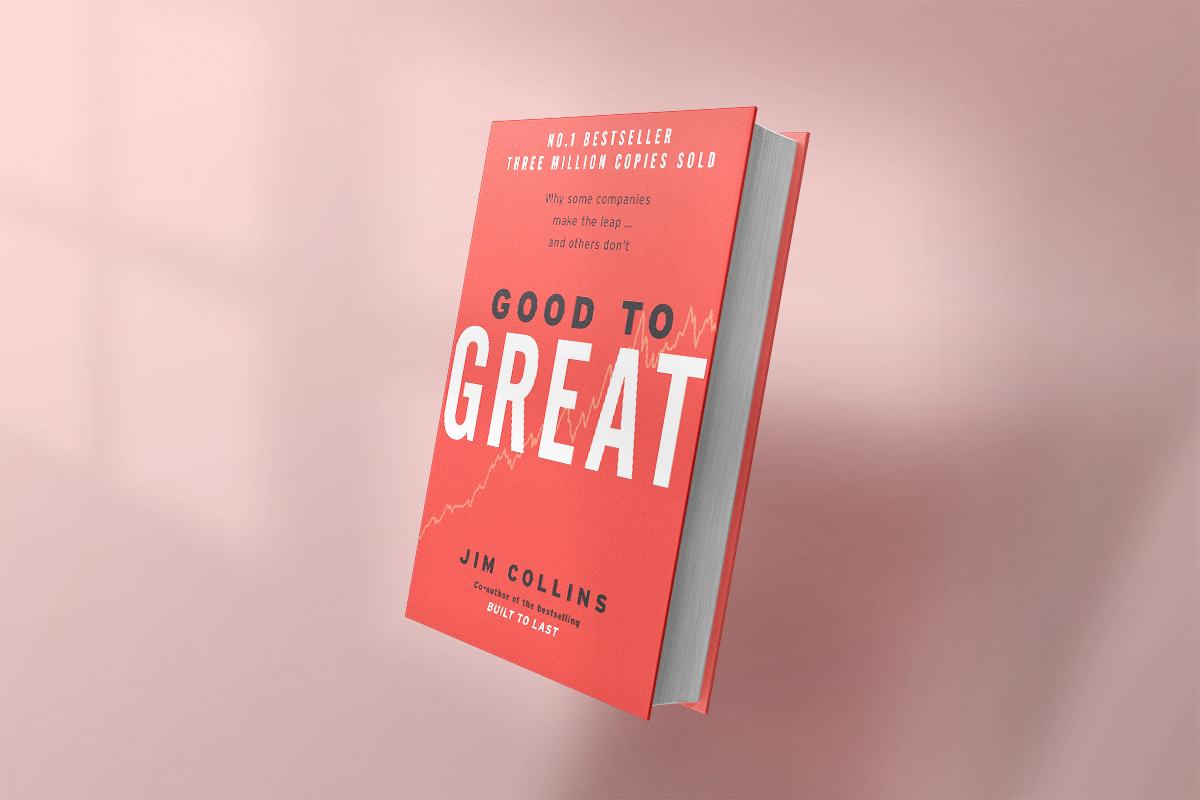 The book Good to Great by Jim Collins, featuring a bold red cover with a subtle upward-trending graph, explores why some companies make the leap to excellence while others don’t.