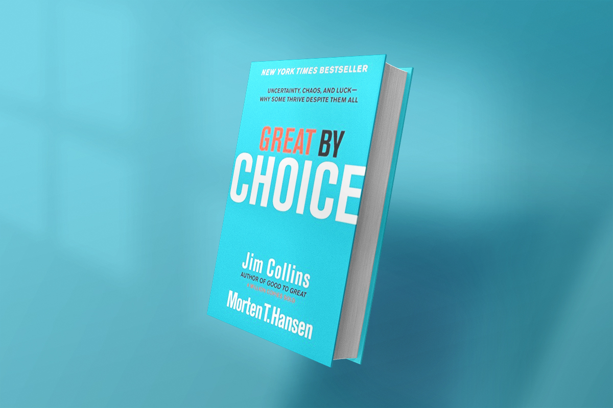The book Great by Choice by Jim Collins and Morten T. Hansen features a bold turquoise cover with white and red text, exploring why some companies thrive in chaos and uncertainty while others fail.