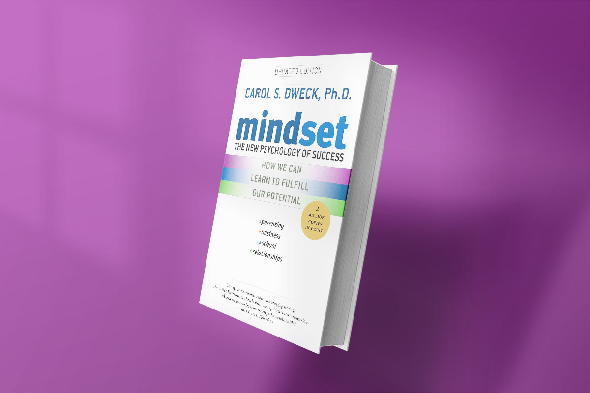 Cover of "Mindset" by Carol S. Dweck, Ph.D., with the subtitle "The New Psychology of Success," featuring a clean white design with rainbow-colored bands and topics like parenting, business, school, and relationships.