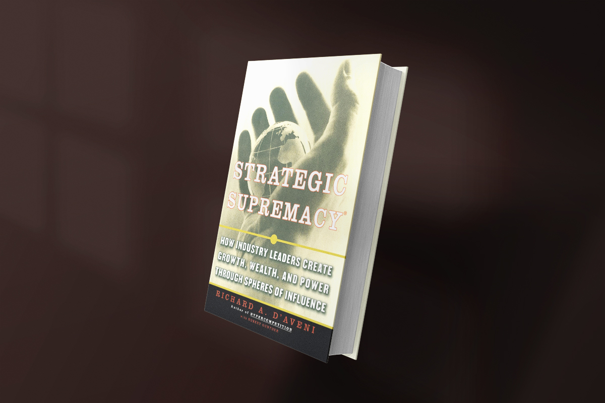 The book Strategic Supremacy by Richard A. D’Aveni, featuring a cover with a globe held in a hand, explores how leading companies build dominance through spheres of influence, shaping growth, wealth, and long-term power.