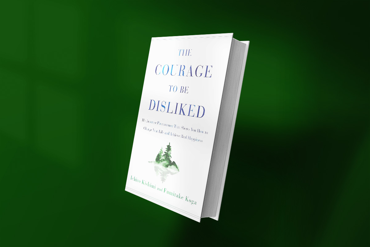 Cover of The Courage to Be Disliked by Ichiro Kishimi and Fumitake Koga, featuring minimalist white design with blue title text and a watercolor illustration of pine trees on a small hill.