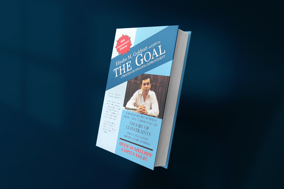 Cover of The Goal by Eliyahu M. Goldratt and Jeff Cox, featuring a blue geometric layout with a photo of Goldratt, promoting its focus on the Theory of Constraints and business improvement.