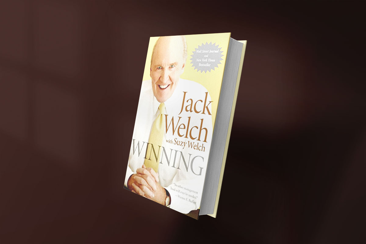 Book cover of Winning by Jack Welch with Suzy Welch, featuring a smiling portrait of Jack Welch in a yellow tie, with bold title text and a New York Times Bestseller badge.